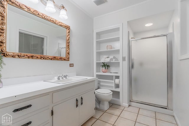 bathroom featuring a stall shower, toilet, ornamental molding, built in features, and tile patterned flooring