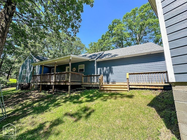 3013 Park Hill Blvd, Jonesboro, AR 72404 - rear view of property with a yard and a deck