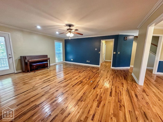 3013 Park Hill Blvd, Jonesboro, AR 72404 - unfurnished living room featuring light wood-style flooring, a ceiling fan, crown molding, baseboards, and recessed lighting