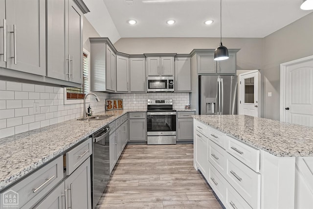 506 S Edmonds St, Monette, AR 72447 - kitchen featuring appliances with stainless steel finishes, gray cabinetry, a sink, light wood-type flooring, and recessed lighting