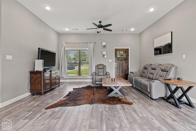 506 S Edmonds St, Monette, AR 72447 - living area featuring baseboards, wood finished floors, ceiling fan, and recessed lighting