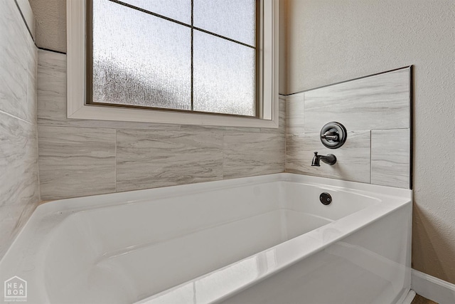 506 S Edmonds St, Monette, AR 72447 - full bath featuring a bath and a textured wall