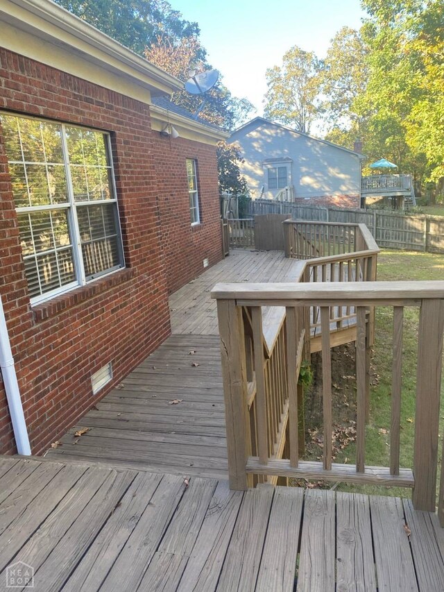 2604 Michael Ln, Jonesboro, AR 72404 - wooden deck with fence