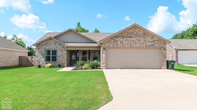 305 Stella Dr, Bono, AR 72416 - view of front of house featuring an attached garage, brick siding, concrete driveway, and roof with shingles