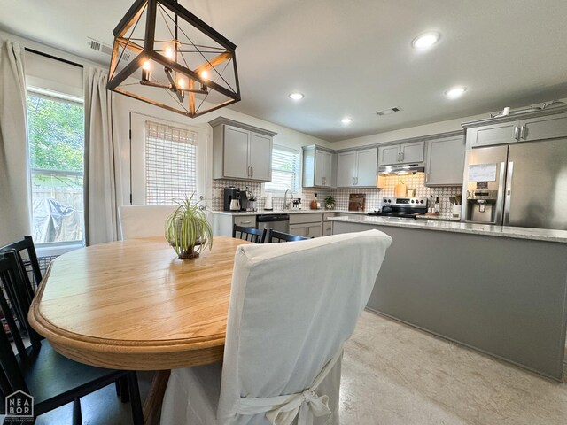 305 Stella Dr, Bono, AR 72416 - dining space with a chandelier and recessed lighting