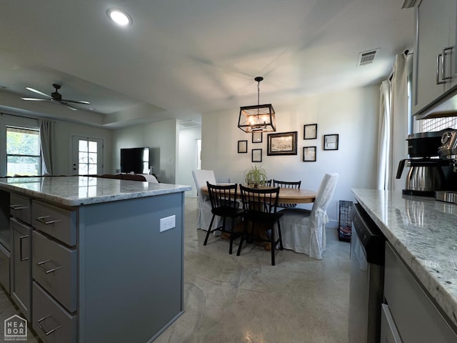 305 Stella Dr, Bono, AR 72416 - kitchen featuring gray cabinets, ceiling fan, open floor plan, light stone countertops, and recessed lighting