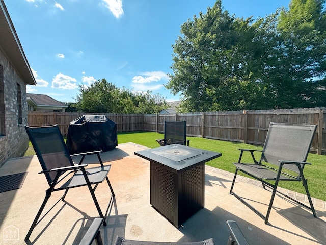 305 Stella Dr, Bono, AR 72416 - fenced backyard with area for grilling and a patio area