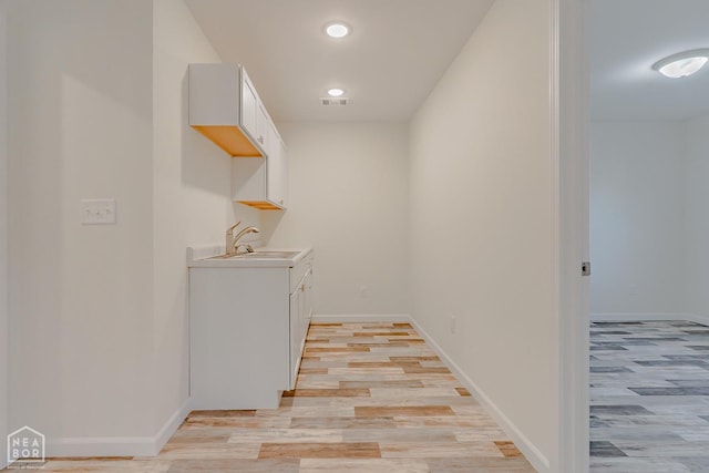 2516 Rebecca Dr, Pocahontas, AR 72455 - hall featuring light wood-type flooring and recessed lighting