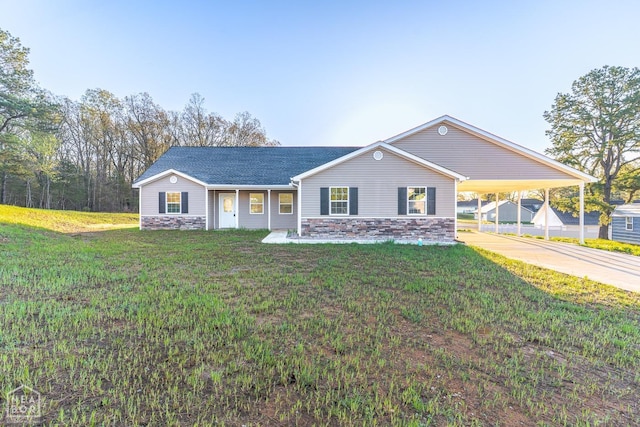 2516 Rebecca Dr, Pocahontas, AR 72455 - single story home featuring stone siding, an attached carport, concrete driveway, a front lawn, and roof with shingles