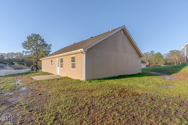 2516 Rebecca Dr, Pocahontas, AR 72455 - view of side of home featuring a lawn and a patio
