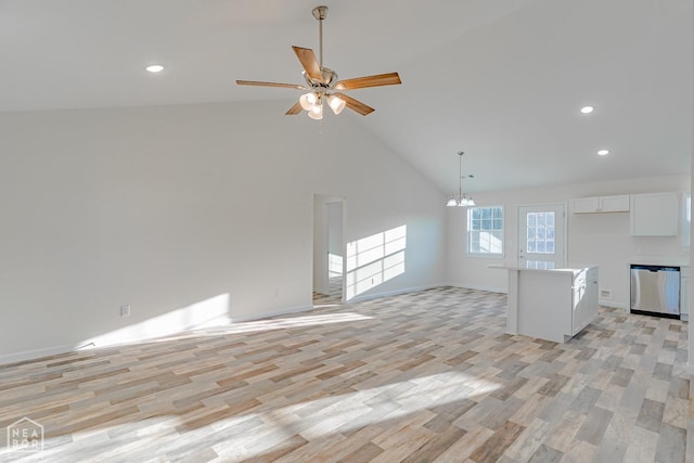 2516 Rebecca Dr, Pocahontas, AR 72455 - unfurnished living room with light wood finished floors, high vaulted ceiling, a chandelier, ceiling fan, and recessed lighting