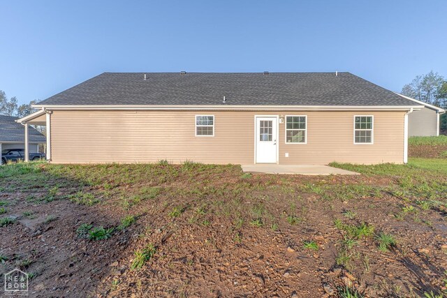 2516 Rebecca Dr, Pocahontas, AR 72455 - back of house featuring a patio area and roof with shingles