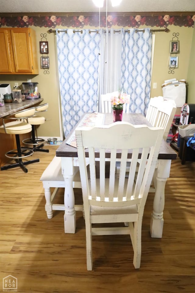 dining room featuring light wood-style flooring