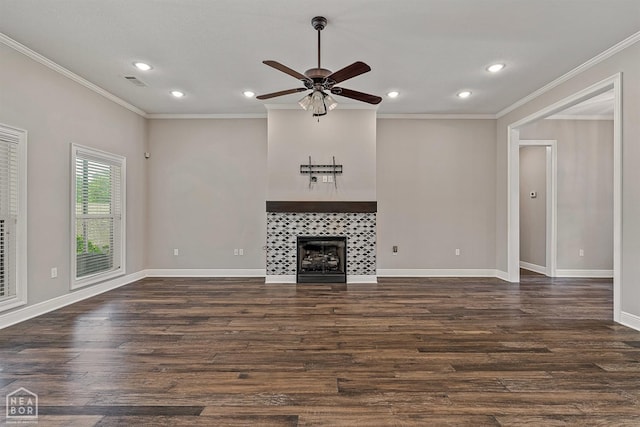 unfurnished living room with a fireplace, crown molding, a ceiling fan, and recessed lighting
