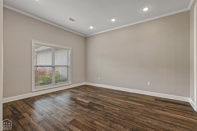 empty room featuring recessed lighting, baseboards, dark wood finished floors, visible vents, and crown molding