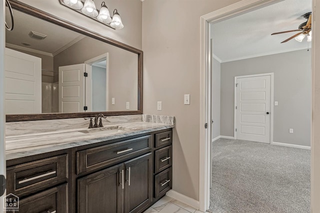 bathroom with ornamental molding, baseboards, a ceiling fan, and visible vents
