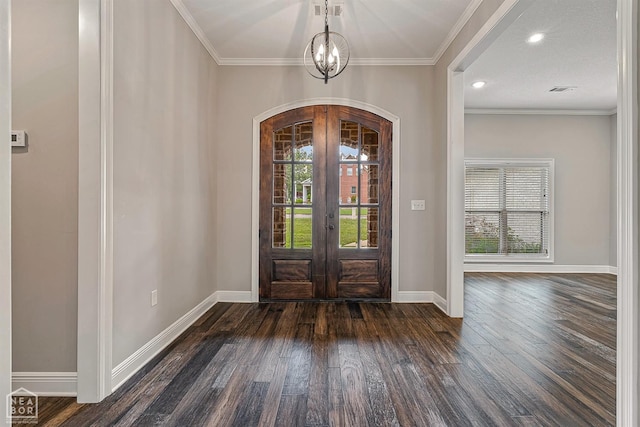 foyer entrance featuring arched walkways, a wealth of natural light, french doors, and dark wood-type flooring