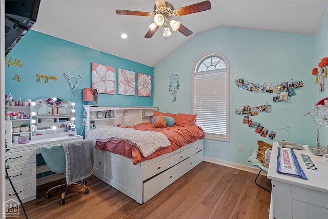 bedroom with a ceiling fan, baseboards, recessed lighting, wood finished floors, and vaulted ceiling