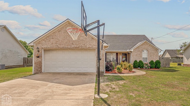 ranch-style home with fence, an attached garage, a front lawn, brick siding, and driveway
