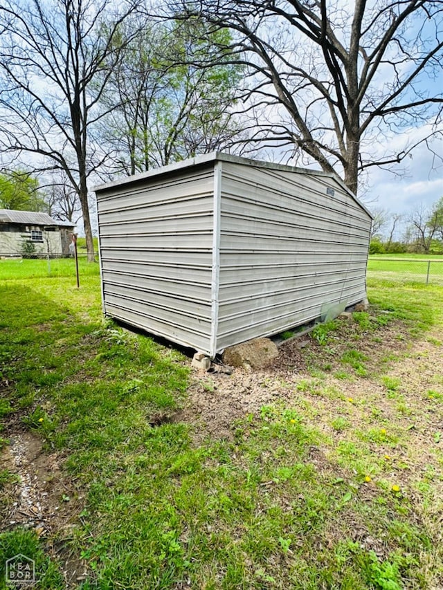 315 Arrington St, Newport, AR 72112 - view of outbuilding with an outdoor structure
