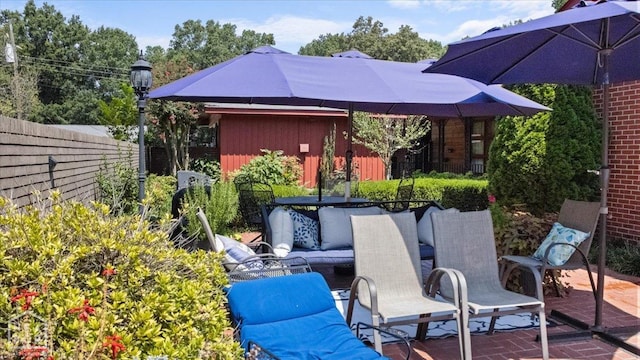view of patio / terrace featuring outdoor lounge area and fence private yard