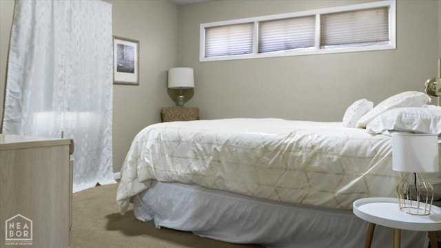 bedroom featuring carpet