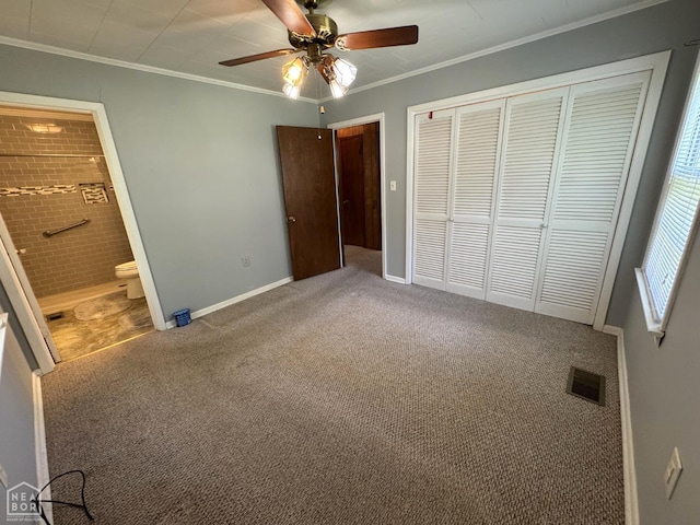 937 Homecrest Dr, Piggott, AR 72454 - unfurnished bedroom with ornamental molding, carpet floors, a closet, connected bathroom, and a ceiling fan