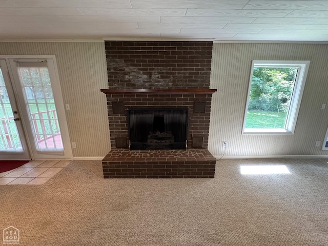 937 Homecrest Dr, Piggott, AR 72454 - unfurnished living room featuring plenty of natural light, carpet floors, ornamental molding, and a fireplace