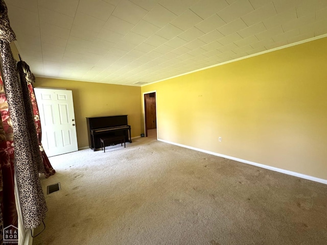 937 Homecrest Dr, Piggott, AR 72454 - carpeted living area featuring baseboards and crown molding