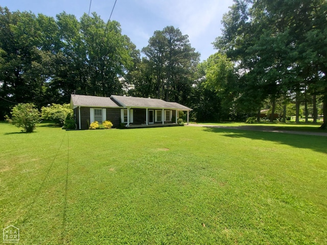 937 Homecrest Dr, Piggott, AR 72454 - view of green lawn