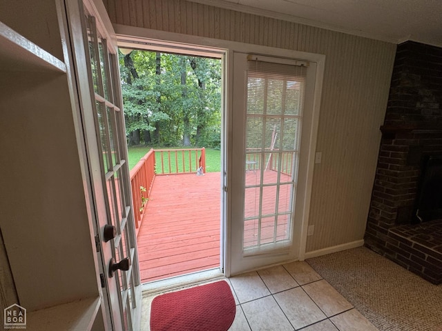 937 Homecrest Dr, Piggott, AR 72454 - entryway featuring tile patterned flooring and ornamental molding