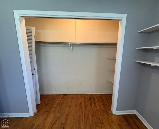 937 Homecrest Dr, Piggott, AR 72454 - spacious closet with wood finished floors