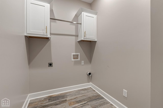 laundry area featuring hookup for an electric dryer, baseboards, hookup for a washing machine, and cabinet space