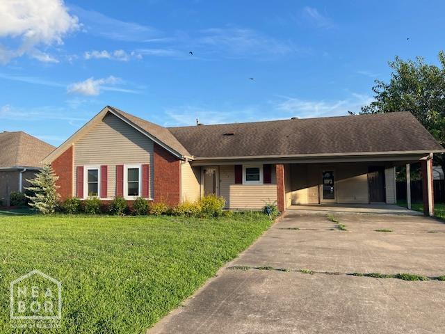 1213 Pauline St, Trumann, AR 72472 - single story home with an attached carport, a front yard, concrete driveway, and brick siding