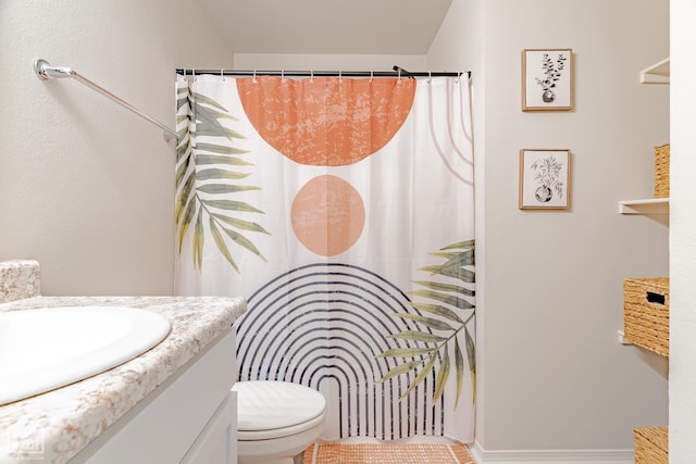 5405 Yukon Dr, Jonesboro, AR 72405 - bathroom with vanity, curtained shower, and vaulted ceiling