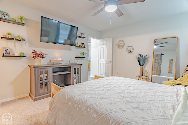 5405 Yukon Dr, Jonesboro, AR 72405 - carpeted bedroom featuring baseboards and ceiling fan