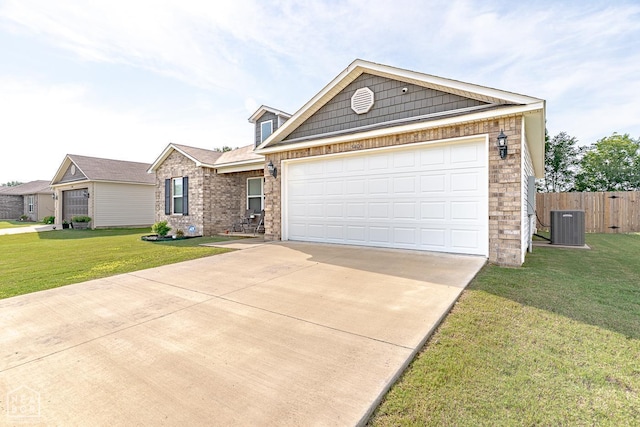 5405 Yukon Dr, Jonesboro, AR 72405 - view of front of property featuring driveway, a garage, and brick siding