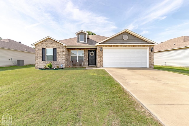 5405 Yukon Dr, Jonesboro, AR 72405 - view of front of house featuring driveway, a front yard, a garage, and brick siding