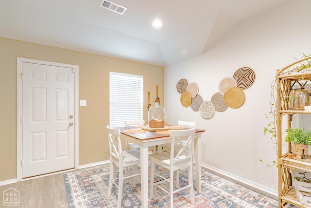 5405 Yukon Dr, Jonesboro, AR 72405 - dining room featuring light wood-style flooring and lofted ceiling