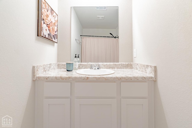 5405 Yukon Dr, Jonesboro, AR 72405 - full bathroom featuring vanity and a shower with curtain