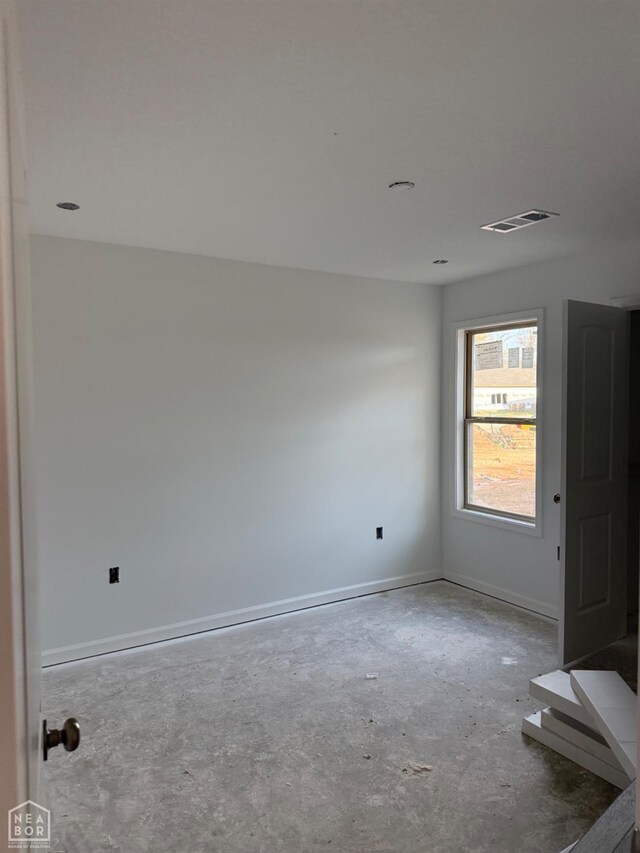 5701 Morgan Dr, Jonesboro, AR 72401 - spare room featuring visible vents and baseboards