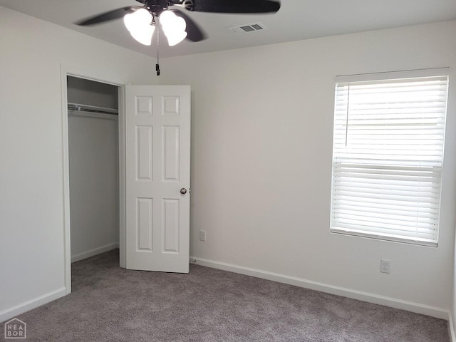 4909 Prospector Dr, Jonesboro, AR 72405 - unfurnished bedroom featuring carpet, a closet, and ceiling fan