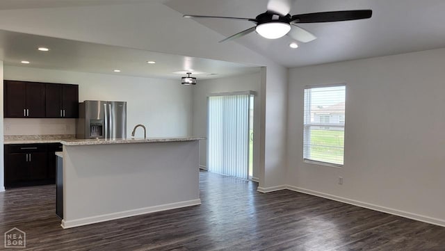 4909 Prospector Dr, Jonesboro, AR 72405 - kitchen with stainless steel refrigerator with ice dispenser, ceiling fan, dark wood-style floors, lofted ceiling, and recessed lighting