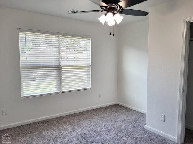 4909 Prospector Dr, Jonesboro, AR 72405 - carpeted empty room with a ceiling fan and baseboards