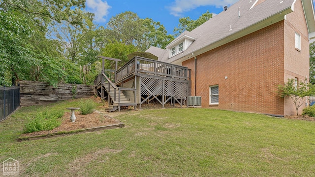 15 Plantation Oaks Ln, Jonesboro, AR 72401 - rear view of house featuring brick siding, cooling unit, a wooden deck, and stairway