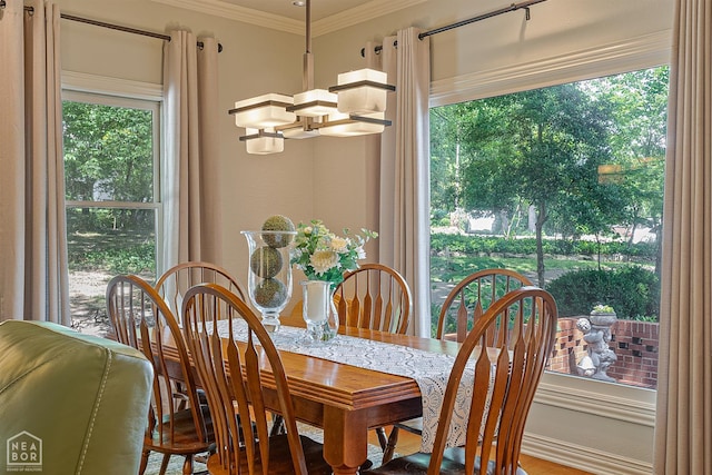 15 Plantation Oaks Ln, Jonesboro, AR 72401 - dining area featuring a chandelier and ornamental molding