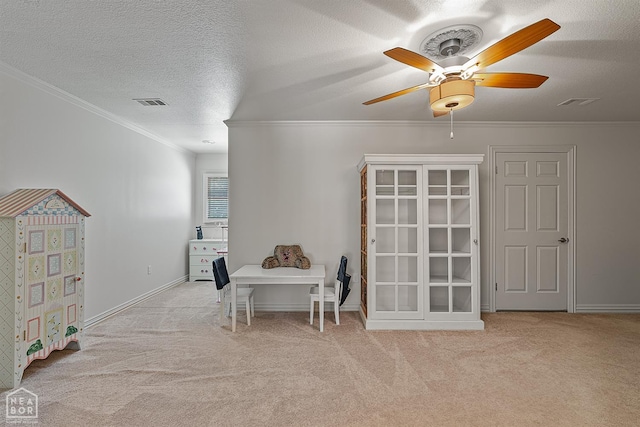 15 Plantation Oaks Ln, Jonesboro, AR 72401 - carpeted dining room with ornamental molding, a ceiling fan, a textured ceiling, and baseboards