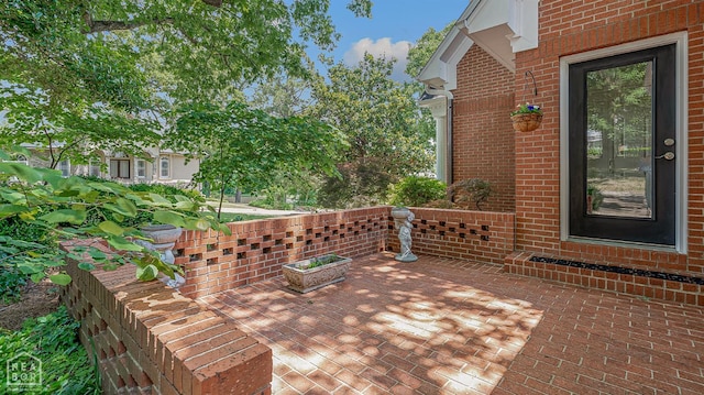 15 Plantation Oaks Ln, Jonesboro, AR 72401 - wooden terrace with a patio