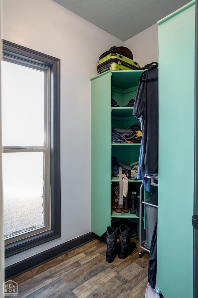 109 Harper Dr, Brookland, AR 72417 - spacious closet featuring wood finished floors