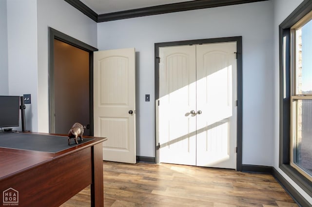 109 Harper Dr, Brookland, AR 72417 - office area featuring crown molding, wood finished floors, and baseboards